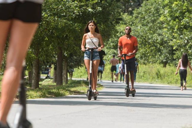 Students on scooters in Atlanta