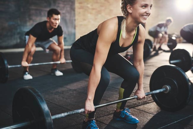 student working out at university gym