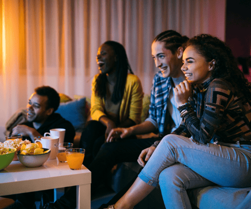 Family watching movies together