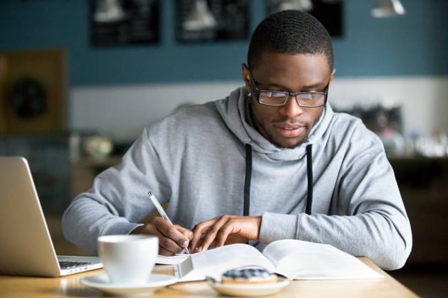 Student studying in cafe