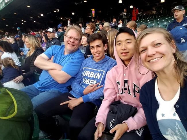 Host family at baseball game