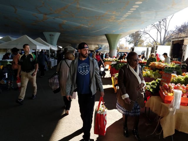 People shopping at the Sacramento Farmers Market