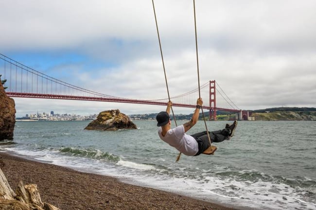 Student Swinging Near Golden Gate Bridge