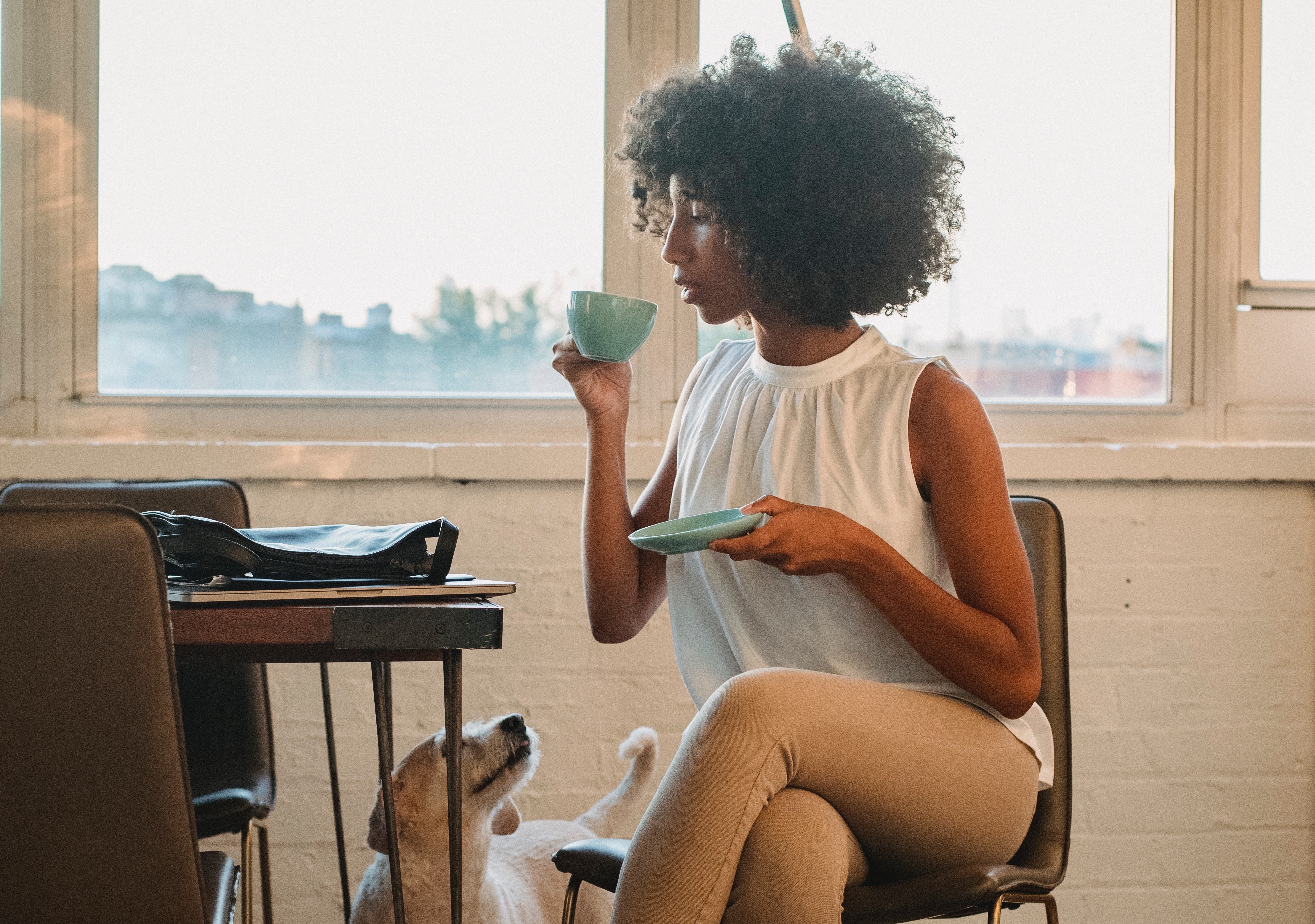 Student Drinking Coffee in an Apartment